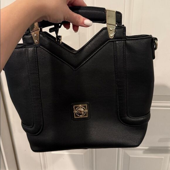 Buy Catherine Malandrino, Large Grommet Leopard Tote Online  Catherine Malandrino Black and Gold Handbag